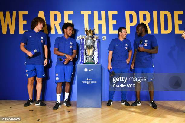 David Luiz, Willian, Pedro and Victor Moses of Chelsea FC pose with the Premier League trophy during an activity ahead of the Pre-Season Friendly...