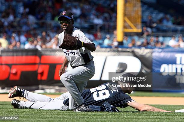 Actor Chris Rock and Kenny Mayne play in the 2008 MLB All-Star Week Taco Bell All-Star Legends & Celebrity Softball Game at Yankee Stadium on July...