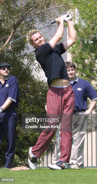 Drummer Adrian Young tees off during the 2nd Annual Mark & Brian Celebrity Golf Tournament March 17, 2001 in Fullerton, CA.