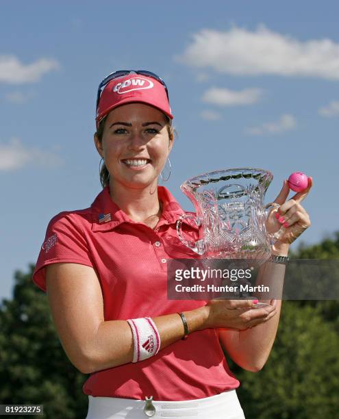 Paula Creamer holds the championship trophy after winning the Jamie Farr Owens Corning Classic at Highland Meadows Golf Club on July 13, 2008 in...