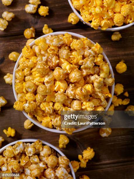 chicago style popcorn, caramel and cheddar mix - caramel popcorn stock pictures, royalty-free photos & images