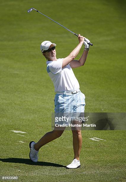 Karrie Webb of Australia hits her third shot on the 1st hole during the final round of the Jamie Farr Owens Corning Classic at Highland Meadows Golf...