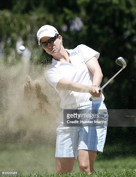 Karrie Webb of Australia hits her third shot on the 5th hole during the final round of the Jamie Farr Owens Corning Classic at Highland Meadows Golf...