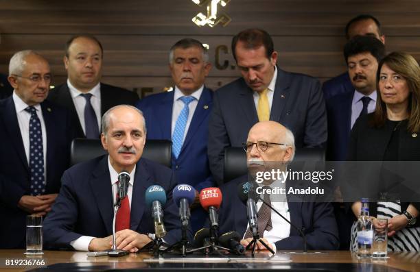 Turkey's new Culture and Tourism Minister Numan Kurtulmus takes over his new post from Nabi Avci during a handover ceremony following Turkish Cabinet...