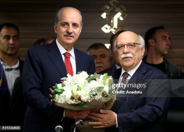 Turkey's new Culture and Tourism Minister Numan Kurtulmus and his predecessor Nabi Avci are seen during a handover ceremony following Turkish Cabinet...