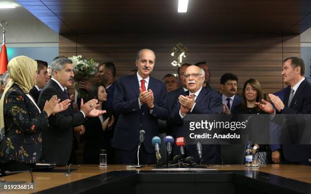 Turkey's new Culture and Tourism Minister Numan Kurtulmus and his predecessor Nabi Avci are seen during a handover ceremony following Turkish Cabinet...