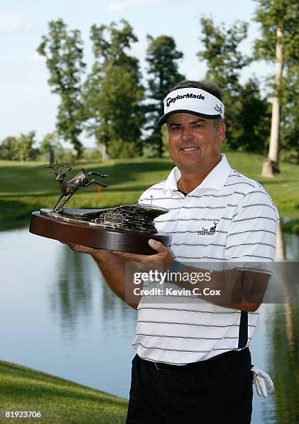 Kenny Perry poses with the trophy after winning the 2008 John Deere Classic at TPC at Deere Run on Sunday, July 13, 2008 in Silvis, Illinois.
