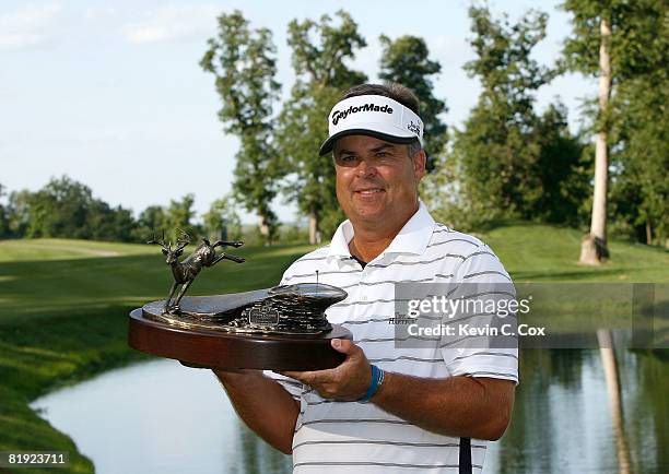 Kenny Perry poses with the trophy after winning the 2008 John Deere Classic at TPC at Deere Run on Sunday, July 13, 2008 in Silvis, Illinois.