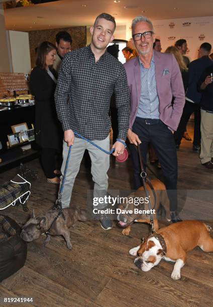 Russell Tovey and Patrick Cox attend the launch of Rosewood’s Canine Luxury Experience and the Barbour Dogs Loyalty Scheme hosted by Rosewood London...