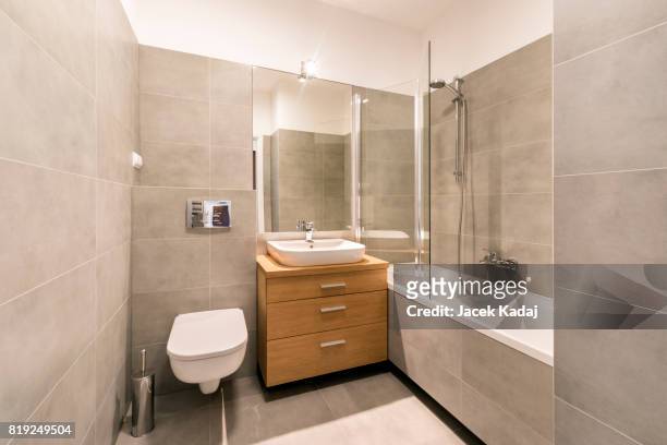 modern bathroom - new bathtub stock pictures, royalty-free photos & images
