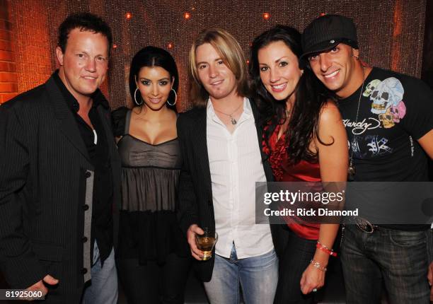 Dean Sams of Lonstar, Kim Kardhashin, Cody Collins of Lonestar, Danielle Peck and Trent Tomlinson attend the opening of The New Fuse Nightclub at The...