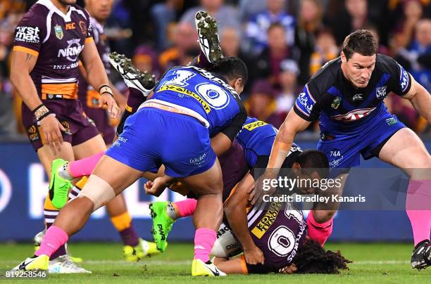 Adam Blair of the Broncos is lifted in the tackle by Danny Fualalo of the Bulldogs during the round 20 NRL match between the Brisbane Broncos and the...