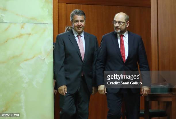 German Foreign Minister Sigmar Gabriel and German Social Democrat and chancellor candidate Martin Schulz emerge before Gabriel spoke to the media...