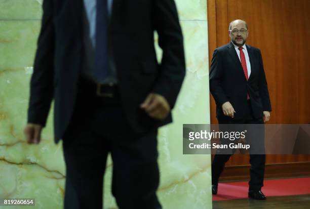 German Social Democrat and chancellor candidate Martin Schulz and German Foreign Minister Sigmar Gabriel emerge before Gabriel spoke to the media...