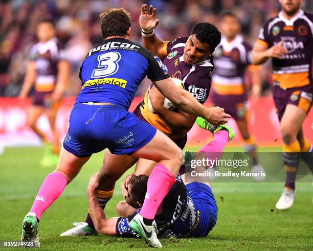 Tevita Pangai Junior of the Broncos takes on the defence during the round 20 NRL match between the Brisbane Broncos and the Canterbury Bulldogs at...