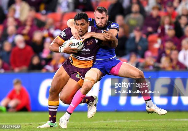 Tevita Pangai Junior of the Broncos is tackled by Josh Reynolds of the Bulldogs during the round 20 NRL match between the Brisbane Broncos and the...