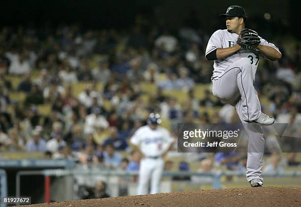 Renyel Pinto of the Florida Marlins pitches against the Los Angeles Dodgers at the bottom of the eighth inning during the game at Dodger Stadium on...