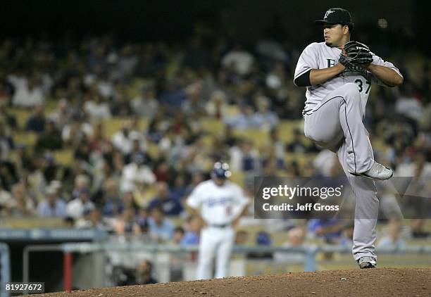 Renyel Pinto of the Florida Marlins pitches against the Los Angeles Dodgers at the bottom of the eighth inning during the game at Dodger Stadium on...