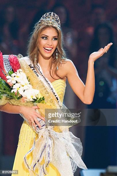 In this handout image, provided by the Miss Universe Organization, Miss Venezuela is crowned the winner of Miss Universe 2008 on stage during the...