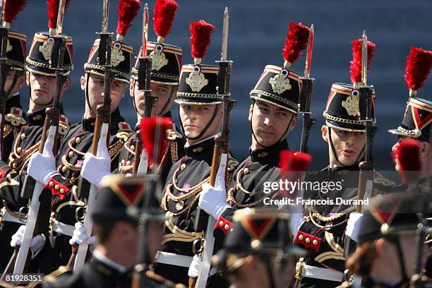 Members of the Military take part in a parade on the Champs-Elysee during the ceremony of the Bastille Day, on July 14, 2008 in Paris. The Union of...