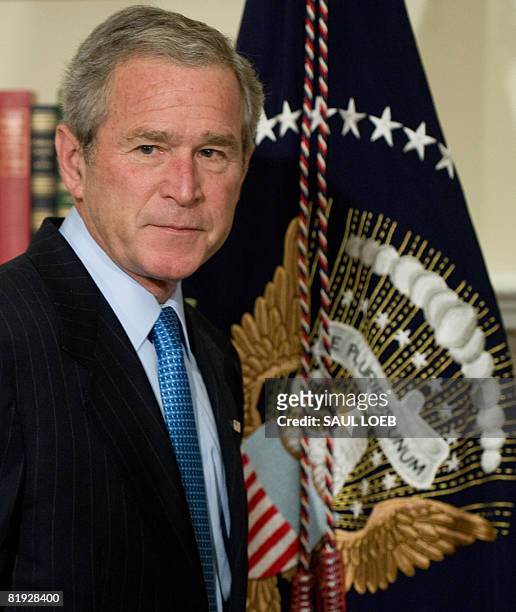 President George W. Bush leaves after speaking regarding the 10th anniversary of the International Religious Freedom Act in the Roosevelt Room of the...