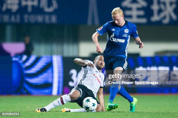 Besiktas Istambul Forward Cenk Tosun trips up with FC Schalke Midfielder Luke Hemmerich during the Friendly Football Matches Summer 2017 between FC...