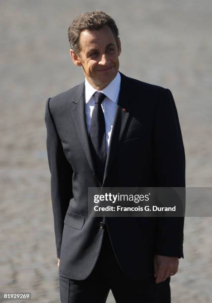 French President Nicolas Sarkozy arrives to attend the ceremony of the Bastille Day, on July 14, 2008 in Paris.