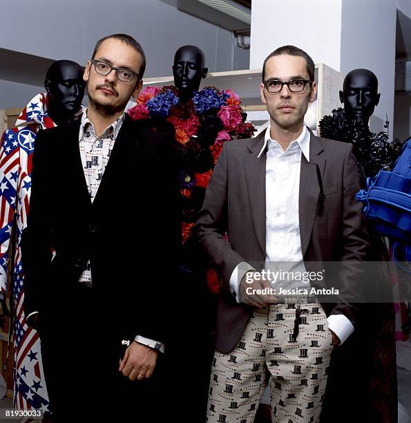 Designers Viktor and Rolf are photographed in the Louvre.