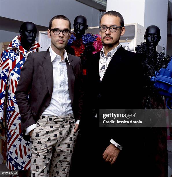 Designers Viktor and Rolf are photographed in the Louvre.