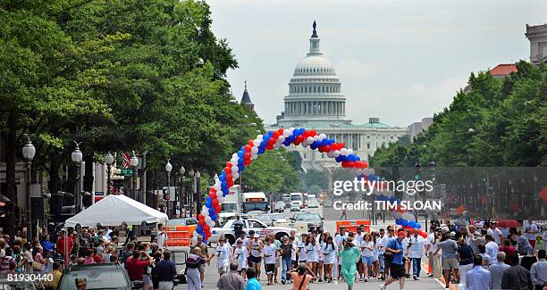 One of three races starts off during The Brasserie Les Halles 34th Annual Waiter and Waitress Race to celebrate Bastille Day on July 14, 2008 on...