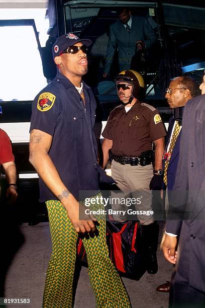 Dennis Rodman of the Chicago Bulls enters the arena prior to Game Three of the 1997 NBA Finals against the Utah Jazz at the Delta Center on June 6,...