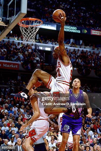 Dennis Rodman of the Chicago Bulls grabs a rebound in Game One of the 1997 NBA Finals against the Utah Jazz at the United Center on June 1, 1997 in...