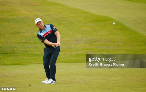 Adam Hodkinson of England chips onto the 4th green during the first round of the 146th Open Championship at Royal Birkdale on July 20, 2017 in...