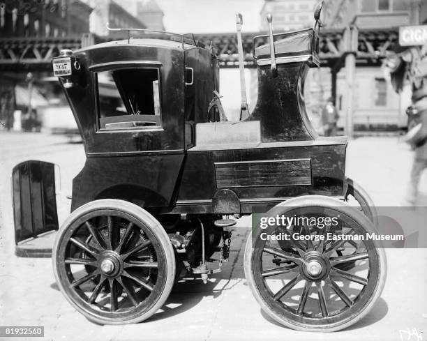 Side view of an early electric hansom taxicab, ca New York, United States