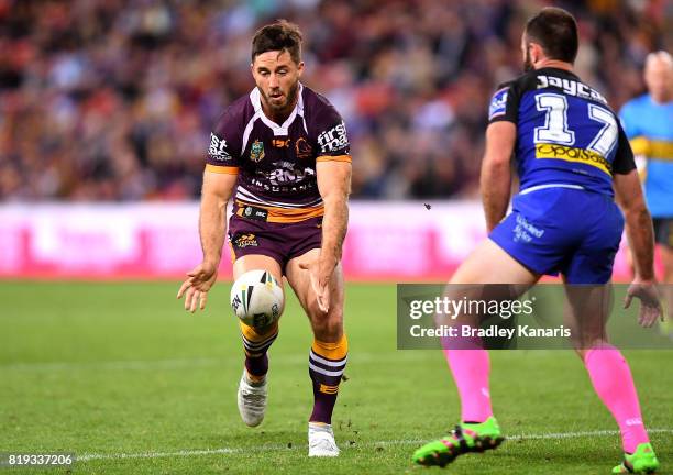 Ben Hunt of the Broncos gets a kick away during the round 20 NRL match between the Brisbane Broncos and the Canterbury Bulldogs at Suncorp Stadium on...