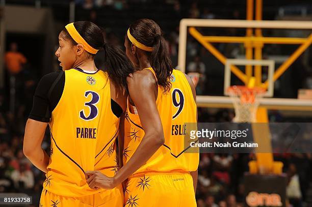 Candace Parker and Lisa Leslie of the Los Angeles Sparks walk off the court after the game against the San Antonio Silver Stars at Staples Center...