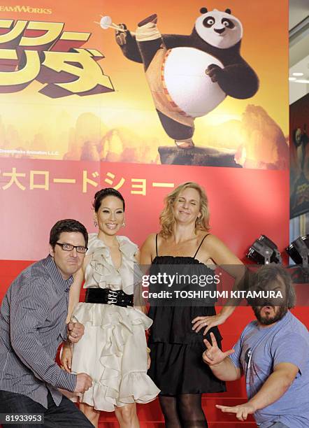 Actor Jack Black and film director Mark Osborne display Kung Fu moves during a photo session with US actress Lucy Liu and producer Melissa Cobb to...