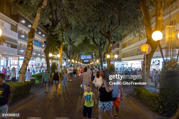 bibione by night, main street - bibione stock pictures, royalty-free photos & images