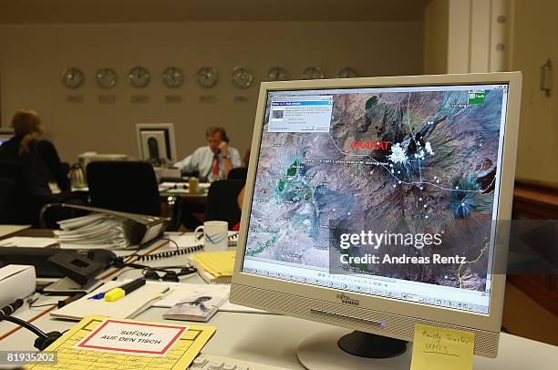 Employees of the German Foreign ministry are seen during a conference in the crisis reaction centre for German hostages at the Foreign Ministry on...