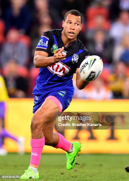 Moses Mbye of the Bulldogs passes the ball during the round 20 NRL match between the Brisbane Broncos and the Canterbury Bulldogs at Suncorp Stadium...