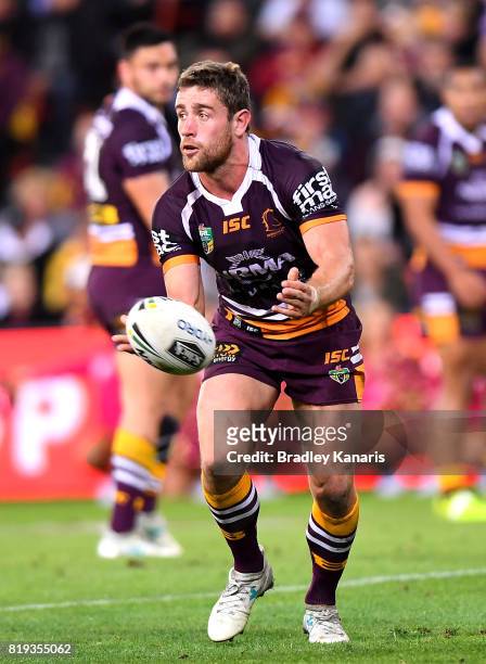 Andrew McCullough of the Broncos passes the ball during the round 20 NRL match between the Brisbane Broncos and the Canterbury Bulldogs at Suncorp...