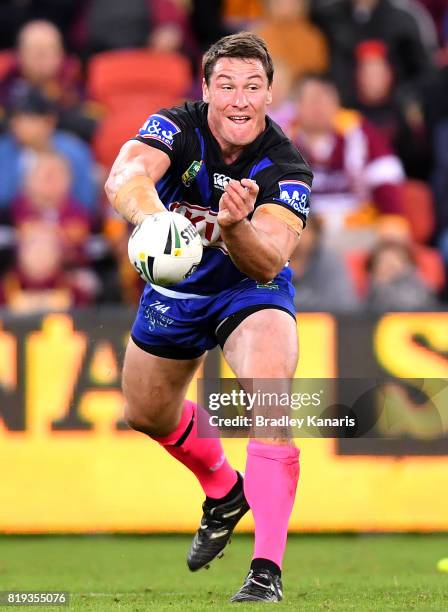 Josh Jackson of the Bulldogs passes the ball during the round 20 NRL match between the Brisbane Broncos and the Canterbury Bulldogs at Suncorp...