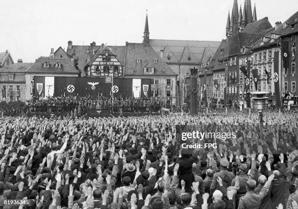 Adolf Hitler addresses a crowd of Sudeten Germans in the marketplace of Eger , 3rd October 1938.