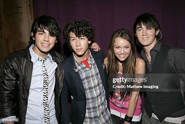 Joseph Jonas, Nick Jonas, Miley Cyrus and Kevin Jonas *EXCLUSIVE*