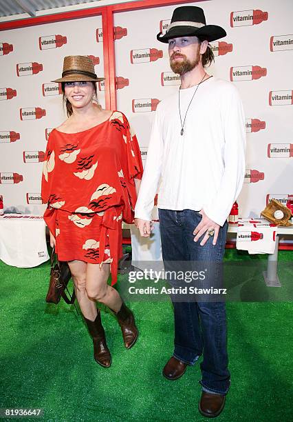 Actress Gina Gershon and guest attends Vitaminwater's MLB All-Star week celebration at Hudson Terrace on July 14, 2008 in New York City.