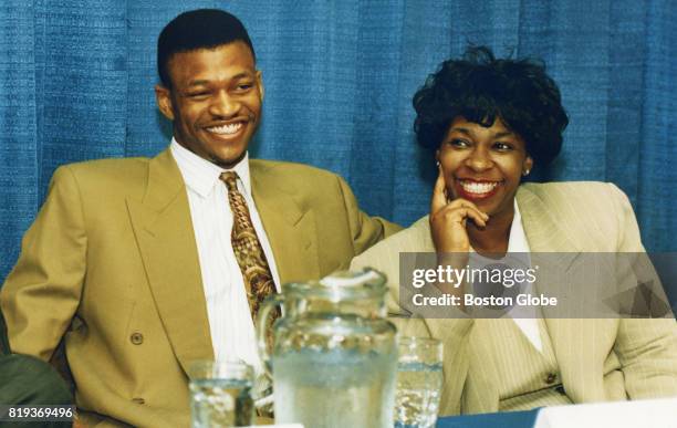 Reggie and Donna Lewis smile as they hear Dr. Gilbert Mudge's diagnosis of Reggie at Brigham and Women's Hospital in Boston, May 10, 1993.