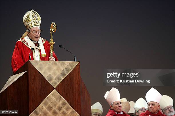 Archbishop of Sydney Cardinal George Pell AC holds Mass on stage at the Opening Mass formally celebrating the start of World Youth Day 2008 at...