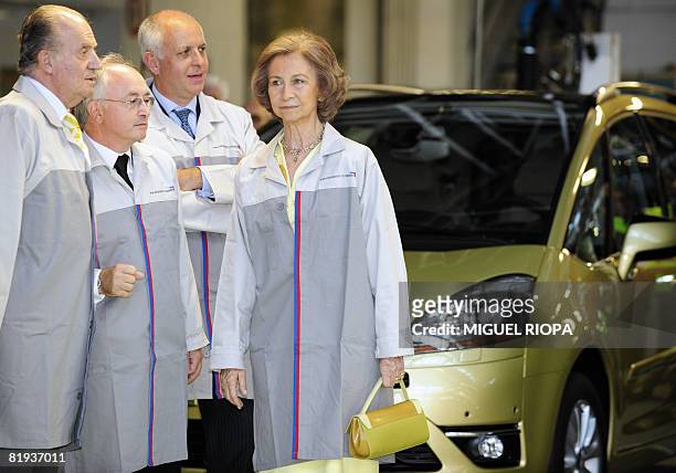 Spain's King Juan Carlos and Queen Sofia visit the PSA Peugeot Citroen's plant in Vigo during celebrations for the 50th anniversary of the plant with...