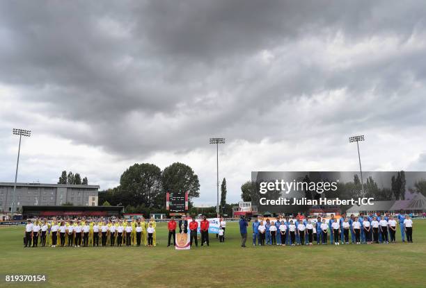 The teams line up to sing the national anthems before The Womens World Cup 2017 Semi-Final between Australia and India at The County Ground on July...