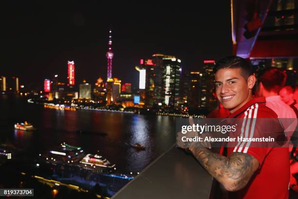 James Rodriguez of FC Bayern Muenchen poses for a picture with the Shanghai Bund in the background during the Audi Night 2017 at Wanda Reign Hotel...